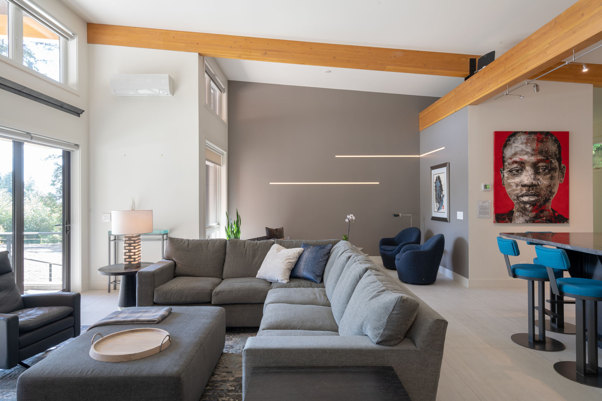 Fourth slide - Modern home great room in Redmond with fur beams and open kitchen